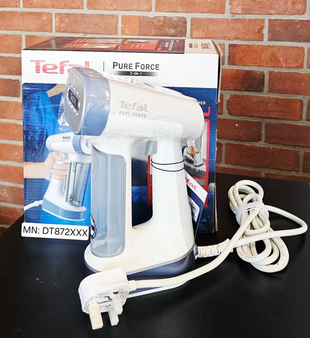 Tefal DT872XXX series belongs to the Tefal Pure Force / 2-in-1 handheld garment steamer line (such as model DT8722)